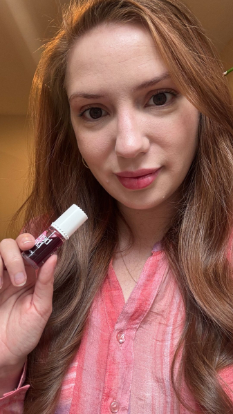 Allure social media director Kassidy Silva after applying the Benefit Cosmetics Benetint Cheek  Lip Stain